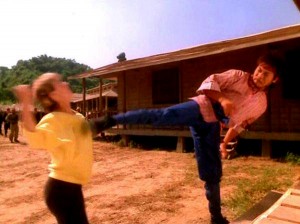 Hwang Jang Lee gives it to Cynthia Rothrock in "No Retreat, No Surrender II: Raging Thunder"